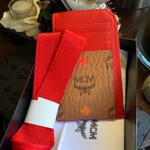 Authentic MCM Leather visetos zip card/Lanyard